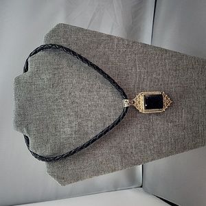 Pendant with black braided leather necklace